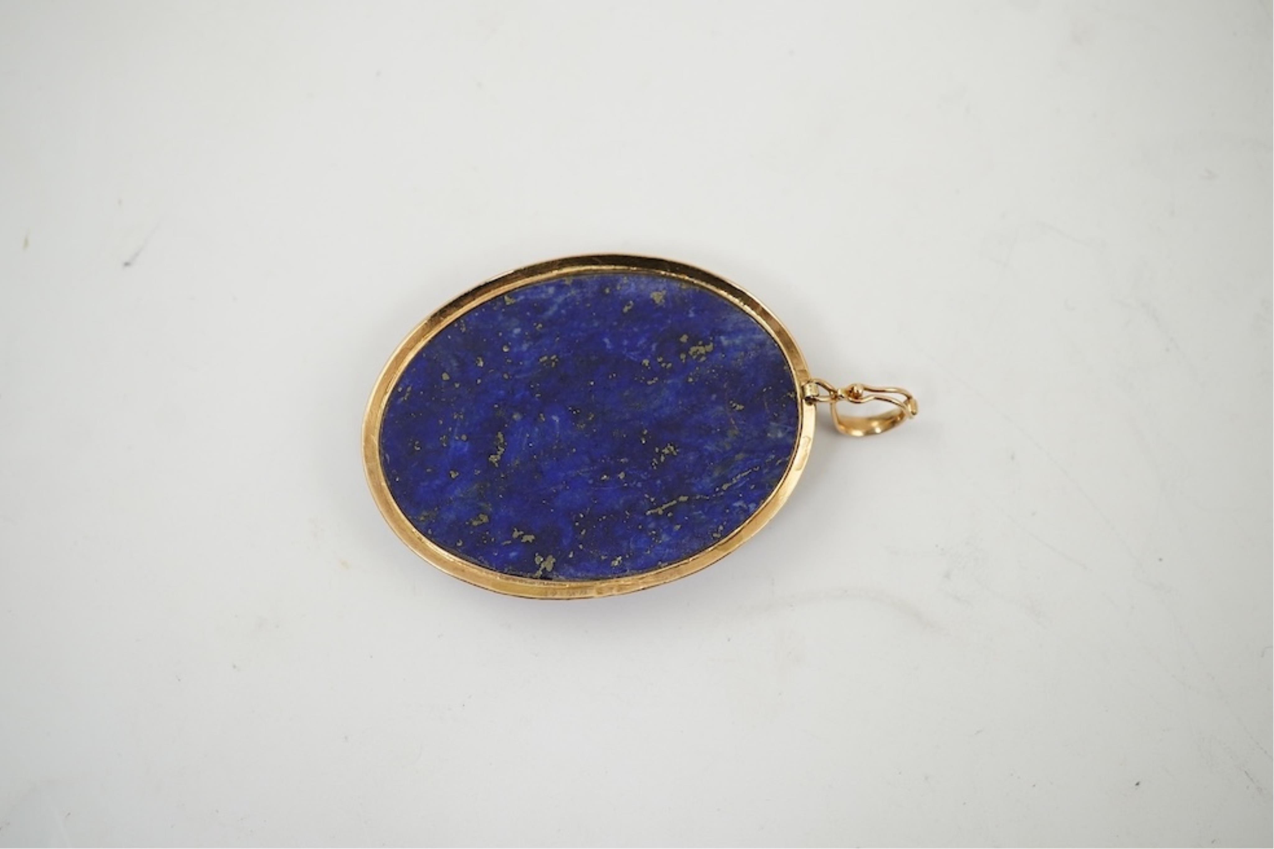 Five assorted modern 375 yellow metal and gem set pendants, a yellow metal and lapis lazuli set pendant (stamped 585?) 40mm, together with a yellow metal dragonfly brooch, a similar small pendant and a white metal bracel